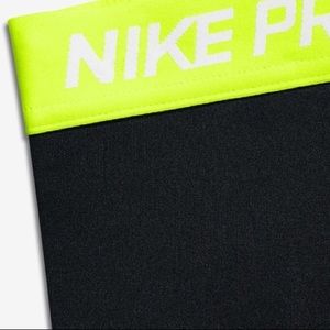 NWOT Black and Neon Yellow Nike Pros